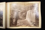 PHOTOGRAPHS OF TASMANIA by J.W. BEATTIE housed in an attractive album with gilt title to the cover, containing 23 albumen prints affixed to pages with hand-written notations and printed captions, images mainly 21 x 26.5 cm. - 11