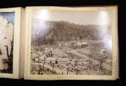 PHOTOGRAPHS OF TASMANIA by J.W. BEATTIE housed in an attractive album with gilt title to the cover, containing 23 albumen prints affixed to pages with hand-written notations and printed captions, images mainly 21 x 26.5 cm. - 13