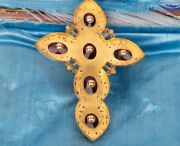 A stunning antique high carat yellow gold cross pendant and matching earrings adorned with two-tone gold florets, set in carbuncle garnets, housed in original leather case with blue silk interior, circa 1860, ​​​​​​​the cross an impressive 9cm high, 19 gr - 7