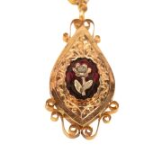 A stunning antique high carat yellow gold cross pendant and matching earrings adorned with two-tone gold florets, set in carbuncle garnets, housed in original leather case with blue silk interior, circa 1860, ​​​​​​​the cross an impressive 9cm high, 19 gr - 8