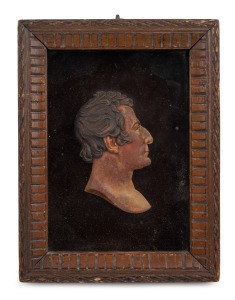 THE DUKE OF WELLINGTON, antique terra cotta profile portrait with polychrome finish, housed in original timber frame and bearing inscription verso, incised with artists details "J Flaxman", early to mid 19th century, 22 x 17cm overall.