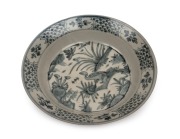 An antique Chinese porcelain bowl (possibly shipwreck), late Ming Dynasty, 17th century, 28cm diameter.