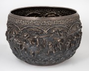 An impressive antique Burmese silver bowl adorned with repousse vignettes and inscribed with a dedication dated 1902, ​​​​​​​20cm high, 28cm wide, 1800 grams. - 2