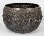 An impressive antique Burmese silver bowl adorned with repousse vignettes and inscribed with a dedication dated 1902, ​​​​​​​20cm high, 28cm wide, 1800 grams. - 3