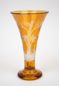 An antique Bohemian amber overlay glass vase with wheel engraved scene, mid 19th century, ​​​​​​​20.5cm high.