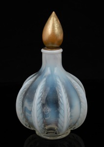 A French opalescent Sabino pressed glass scent bottle with carved timber gilt lid (cork perished), 20th century, 16cm high.