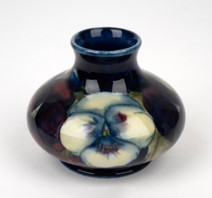 MOORCROFT "Pansy" pottery vase, impressed "Moorcroft, Made In England", 6.5cm high, 8cm wide.