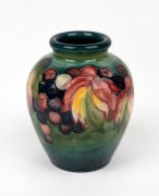 MOORCROFT "Leaves & Berries" pottery vase on green ground, impressed signature mark to base, 11cm high. - 2