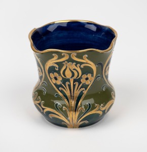 MOORCROFT "Florian Ware" pottery vase on green ground with blue interior and gilded highlights, stamped "MACINTYRE, Burslem, England" with green monogram mark "W.M.", ​​​​​​​8.5cm high.
