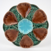 An antique majolica oyster platter, mid 19th century, 24.5cm wide.