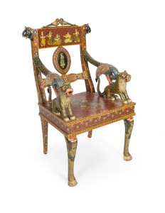 A vintage Rajasthani throne chair with ornate carving and hand-painted decoration, 20th century, 56cm across the arms.