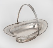 A sterling silver bread basket, made in Sheffield, 20th century, 24cm high, 33cm wide, 614 grams.