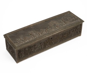 185 · An antique French bronze jewellery casket with red velvet interior, 19th century, 8cm high, 33cm wide, 20cm deep.