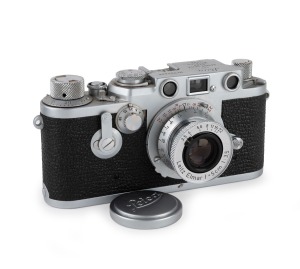 LEITZ: Red-dial (self-timer, Wetzlar) Leica IIIf film camera [#723686], c. 1950, with Elmar 50mm f3.5 lens [#1122175] and Leica lens cap.