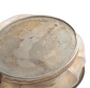 An antique sterling silver milk jug with bright cut decoration, most likely Channel Islands (marks rubbed), early 19th century, 11cm high, 16cm wide, 150 grams. - 4