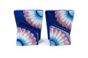 CARLTON WARE pair of English porcelain Art Deco bookends with floral decoration on blue ground, black factory mark to base, 13cm high. - 2