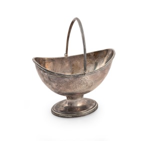 4 · A Georgian sterling silver bon bon basket with engraved family crest, made in London, circa 1784, 16cm high, 215 grams.