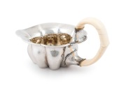 JOSEF HOFFMANN (1870-1956), WIENER WERKST&Auml;TTE stunning Austrian silver and ivory tea service, comprising a teapot, milk jug, sugar bowl, sugar tongs and tray, circa 1918. This model tea service was exhibited at the, Arts Decoratifs Et Industriels Modernes - 6