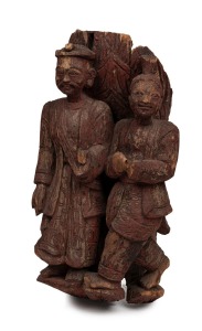 An antique Burmese architectural figural group with remains of red polychrome finish (note: some losses), 18th/19th century, 45cm high.