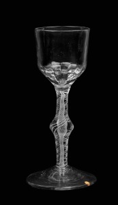 An antique English glass with double air twist and knopped stem, 18th century, 14.5cm high.