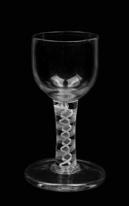 An antique cordial glass with double air twist stem, 18th/19th century, 11cm high.