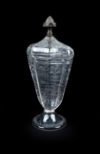 An antique Austro-Hungarian lidded crystal urn with high quality wheel cut intaglio decoration and silver finial, 19th century, ​​​​​​​24.5cm high.