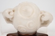 An antique Chinese carved mutton jade cup on later carved timber stand, Ming Dynasty, 6cm high, 13.5cm wide, 8cm high on stand. PROVENANCE: The Rod Thomas Collection, Melbourne. - 7
