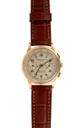 A vintage Swiss chronograph automatic wristwatch in 18ct gold case, 4cm wide including crown.