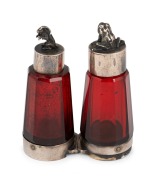 A handsome antique double ended faceted ruby glass scent bottle with figural rabbit and frog silver plated lids with unusual central hinge revealing a vinaigrette compartment, mid 19th century, 13cm long. - 2