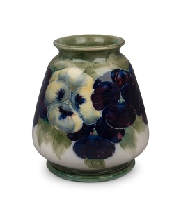MOORCROFT "Pansy" pottery vase on early celadon and cream ground, circa 1914, impressed "MOORCROFT, BURSLEM, 1914" with underglaze green signature "W. Moorcroft", 10cm high.