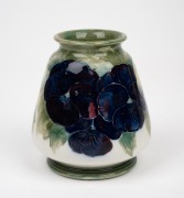 MOORCROFT "Pansy" pottery vase on early celadon and cream ground, circa 1914, impressed "MOORCROFT, BURSLEM, 1914" with underglaze green signature "W. Moorcroft", 10cm high. - 2