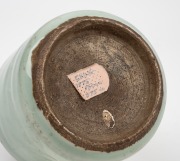 An antique Chinese celadon glazed brush pot, Qing Dynasty, 17th/18th century, 9.5cm high. ​​​​​​​PROVENANCE: The Rod Thomas Collection, Melbourne. - 3