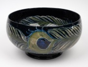 MOORCROFT stunning "Peacock Feather" pattern pottery bowl on dark blue ground developed at Cobridge in 1918, impressed "Moorcroft, Burslem", featured in the Paul Atterbury publication "Moorcroft Pottery A Guide To The Pottery Of William and Walter, 1897 - 2