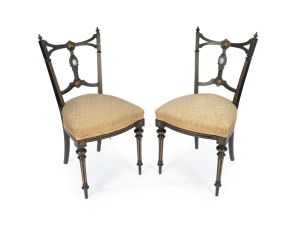 A fine quality pair of antique English ebonized mahogany side chairs with WEDGWOOD porcelain medallion backs mounted in ormolu, retaining the original upholstery. These chairs where purchased at the 1880 Melbourne International Exhibition.
