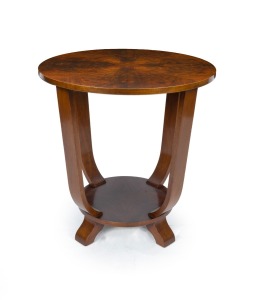 An Art Deco circular walnut centre table, circa 1930, bearing retailer's label "WALTER .G. LORD.......Sydney", 69cm high, 67cm diameter.