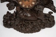 An antique German Black Forest carved timber mantle clock with game bird decoration, with period but replaced French eight day movement, 19th century, - 4