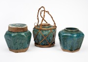 Three antique Chinese green pottery ginger jars, (one with lid), 19th/20th century, the largest 10cm high.