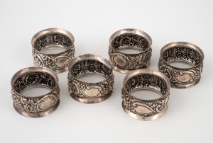 55 · A set of six antique sterling silver napkin rings, made in Chester by William Neale, circa 1900, 150 grams total.