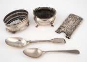 Sterling silver teaspoons, salt cellars and card case cover, (5 items), 130 grams total.