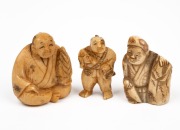 Three Japanese carved ivory figural netsuke, 20th century, the largest 4cm high.