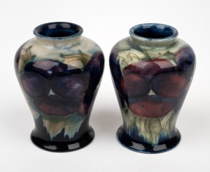 MOORCROFT "Pansy" pair of miniature pottery vases, factory marks to base, 9cm high.
