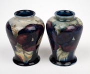 MOORCROFT "Pansy" pair of miniature pottery vases, factory marks to base, 9cm high. - 2