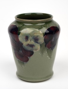 MOORCROFT "Pansy" pottery vase on early celadon ground, impressed "MOORCROFT, BURSLEM, ENGLAND" with underglaze green signature "W. Moorcroft", 10.5cm high.