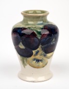 MOORCROFT "Pansy" miniature pottery vase on early celadon and cream ground, impressed "MOORCROFT, BURSLEM" with underglaze green signature "W. Moorcroft", 8.5cm high. - 2