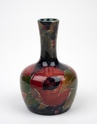 MOORCROFT "Pomegranate" miniature pottery vase on celadon/blue ground, impressed "MOORCROFT, BURSLEM", with early green underglazed signature mark, 9.5cm high. - 2