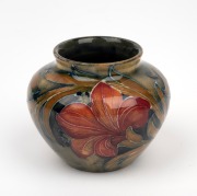 MOORCROFT "Spanish" pattern pottery vase on celadon ground, impressed "MOORCROFT, BURSLEM", ​​​​​​​6cm high.