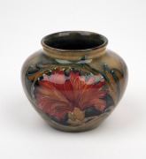 MOORCROFT "Spanish" pattern pottery vase on celadon ground, impressed "MOORCROFT, BURSLEM", ​​​​​​​6cm high. - 2