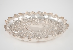 49 · An antique English sterling silver oval dish with repousse decoration, made in Sheffield, circa 1895, ​​​​​​​24cm wide, 263 grams.