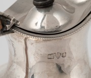 An antique English sterling silver water jug with woven cane insulated handle, made in Chester, circa 1903, ​​​​​​​23cm high, 352 grams total including handle and finial. - 2