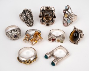 Nine assorted silver rings with stones, 20th century, 95 grams total.